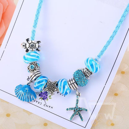 Seashell Charm Bracelet - WikiWii