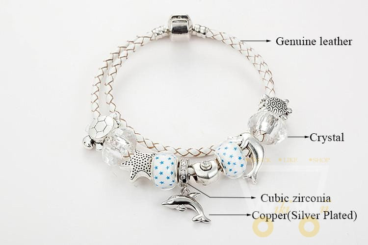 DOLPHINS CHARM BRACELET WHITE LEATHER "2" - WikiWii