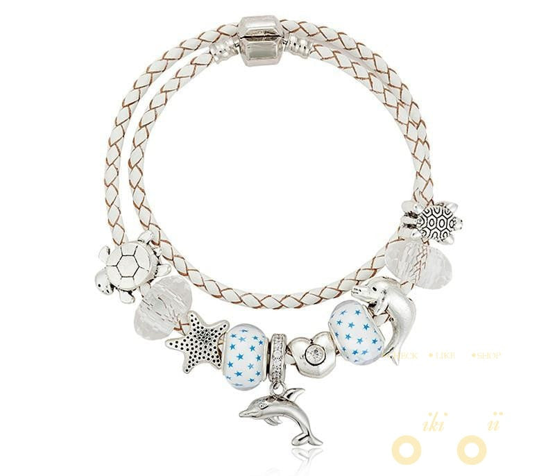 DOLPHINS CHARM BRACELET WHITE LEATHER "2" - WikiWii