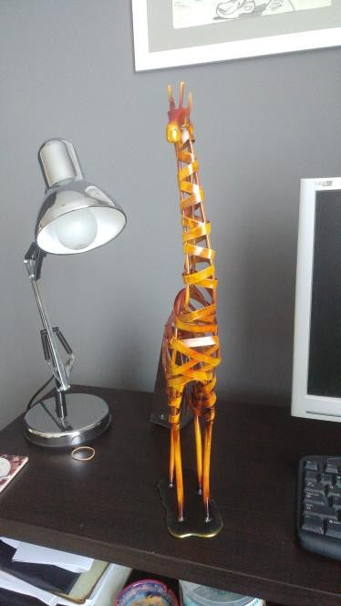 hand-made iron giraffe artwork - WikiWii