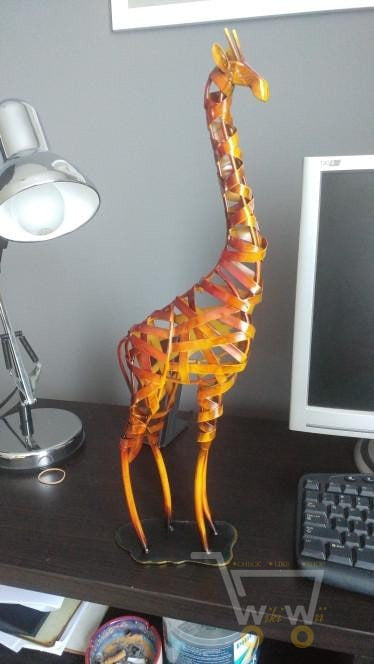 hand-made iron giraffe artwork - WikiWii