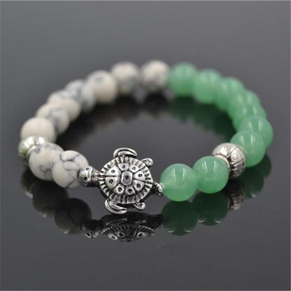 sea turtle charm 8 mm white and green bead bracelet - WikiWii