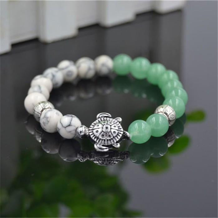 sea turtle charm 8 mm white and green bead bracelet - WikiWii