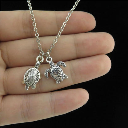 Two Cute Silver Sea Turtles Necklace - WikiWii